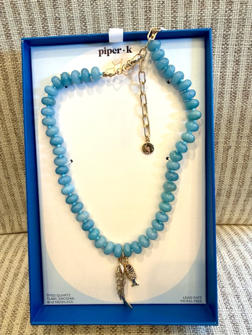 piper•k Sky Blue Beaded Necklace with Gold Chain and Fish Charms